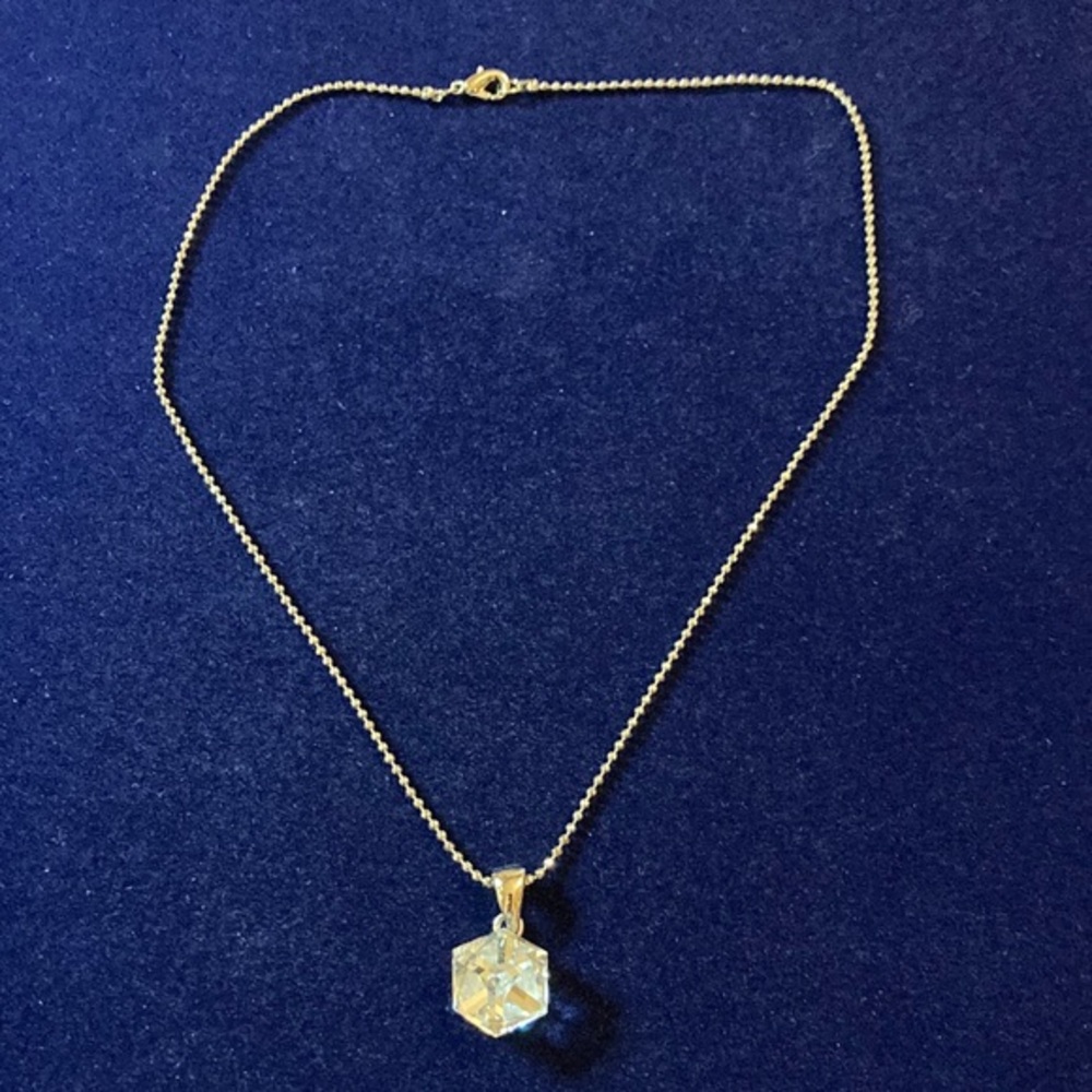 Silver tone chrome diamond cut bank link chain with cubed crystal pendant